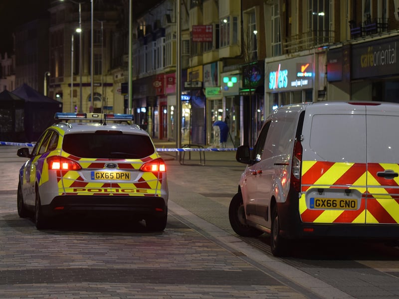 Police at the scene. Photo by Dan Jessup