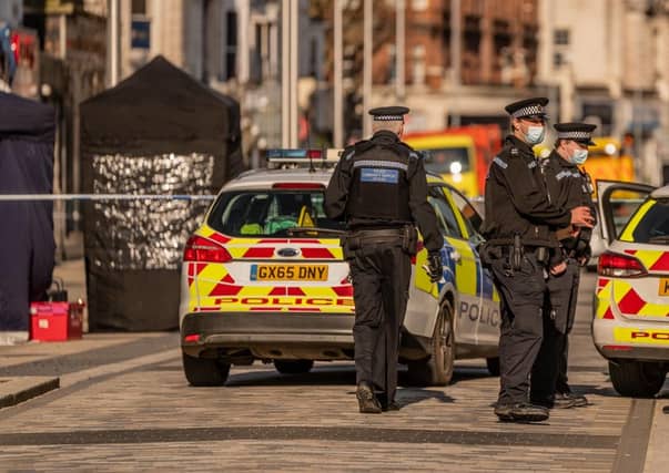 Officers in Eastbourne this morning. Photo by Jon Santa Cruz