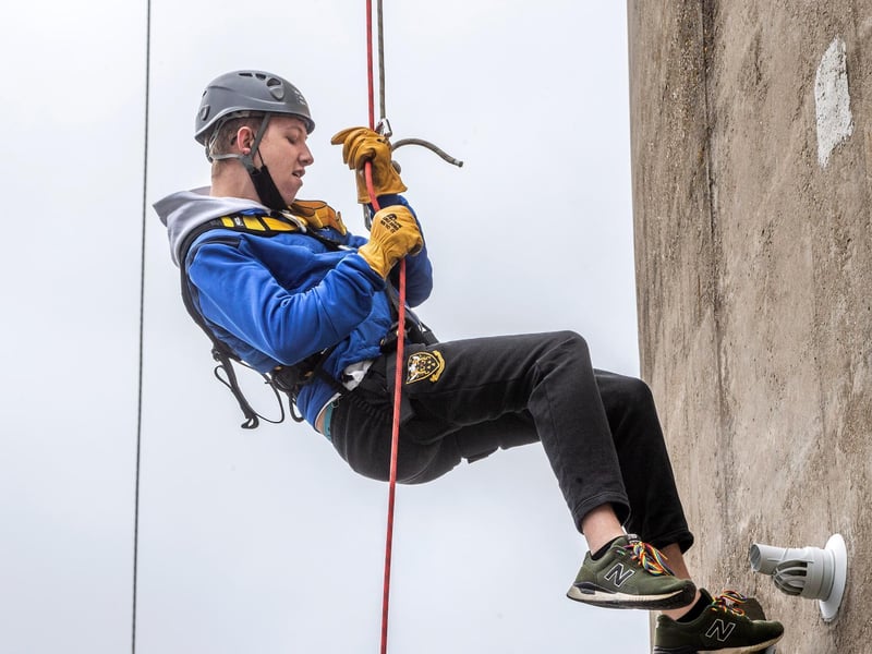 Northampton Saints' mascot, Bernie, abseils down the National Lift Tower to raise money for the NSF (Saturday, May 22).