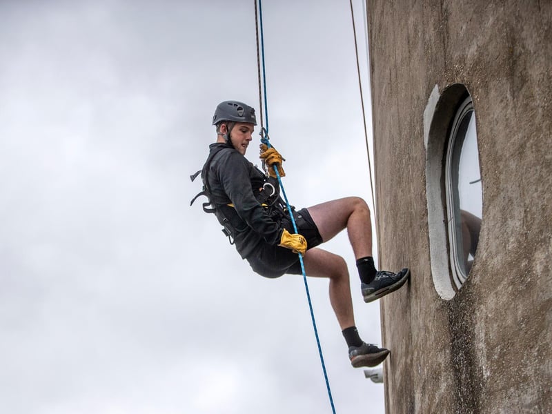 Northampton Saints' mascot, Bernie, abseils down the National Lift Tower to raise money for the NSF (Saturday, May 22).