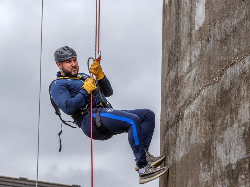 Northampton Saints' mascot, Bernie, abseils down the National Lift Tower to raise money for the NSF (Saturday, May 22).