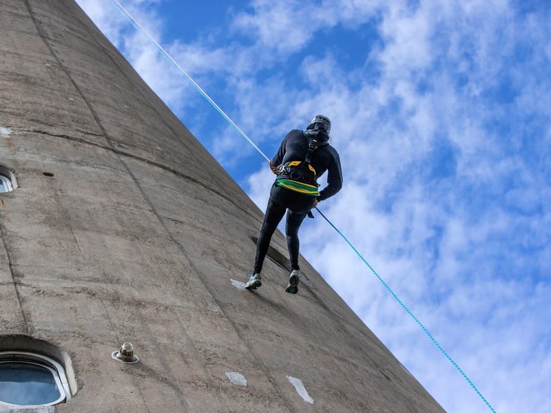 Northampton Saints' mascot, Bernie, abseils down the National Lift Tower to raise money for the NSF (Saturday, May 22).