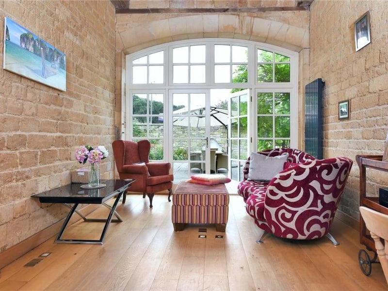 This grade II listed property has traditional features, a gym, a sauna and 19 acres of land.