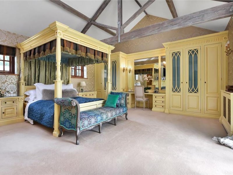 This grade II listed property has traditional features, a gym, a sauna and 19 acres of land.