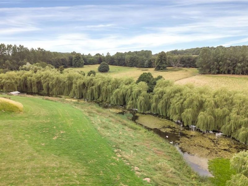 This grade II listed property has traditional features, a gym, a sauna and 19 acres of land.