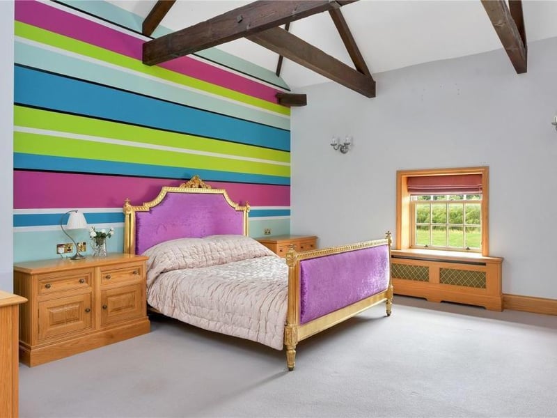 This grade II listed property has traditional features, a gym, a sauna and 19 acres of land.