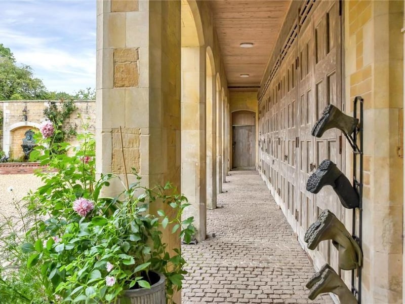 This grade II listed property has traditional features, a gym, a sauna and 19 acres of land.