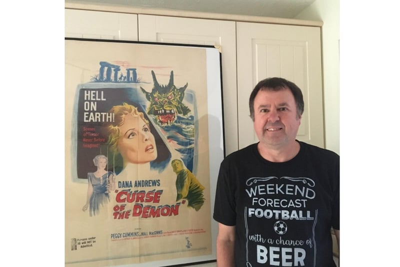Bob Page with one of his more than 200 original movie posters