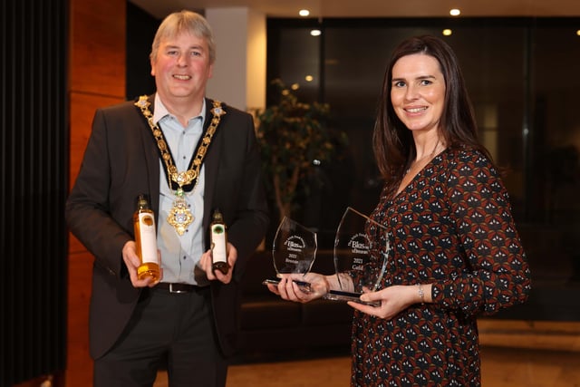 The Mayor of Causeway Coast and Glens Borough Council Councillor Richard Holmes pictured with Blas na hEireann winner Leona Kane from Broighter Gold