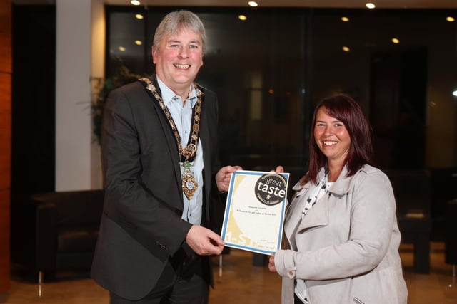 The Mayor of Causeway Coast and Glens Borough Council Councillor Richard Holmes pictured with Great Taste Award winner Lynne Gardiner from Amazin Grazin