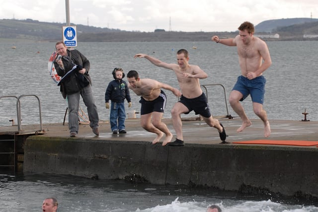 Diving into the lough for the New Year's Day swim.