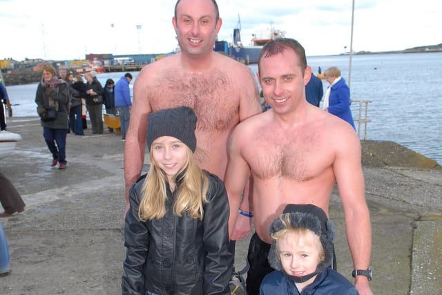 Swimmers Paul Evans and Simon Ferran with Rebecca and Ryan Ferran at the New Year's Day swim at the EABC in 2010.