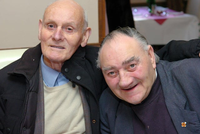 Caught on camera at the members of  Cookstown 040 Christmas dinner were Cecil Scullion and John McFarland.