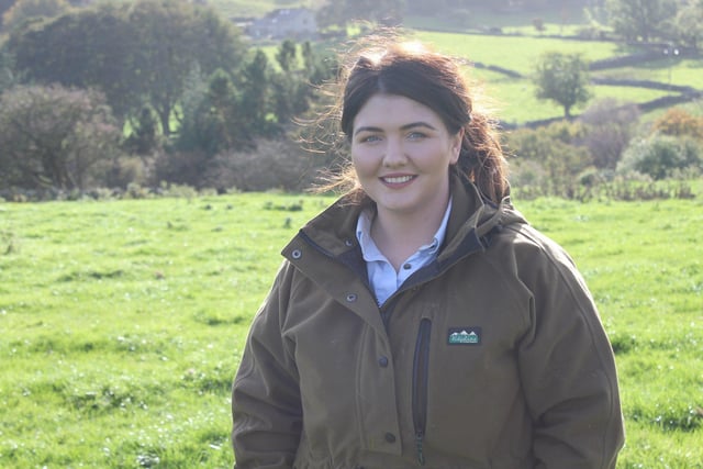 Áine Devlin (aged 23) looks after more than 400 sheep on her family sheep farm in the Mournes, assisted by sheep dogs, Fly and Mist.