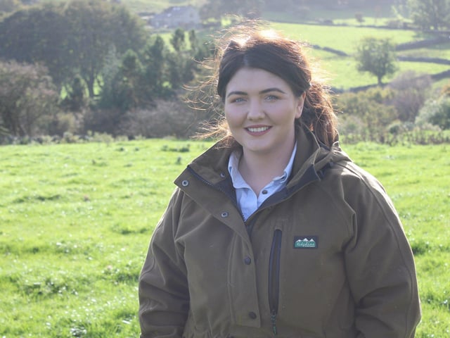 Áine Devlin (aged 23) looks after more than 400 sheep on her family sheep farm in the Mournes, assisted by sheep dogs, Fly and Mist.