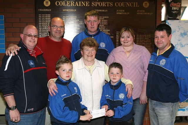 AYR YOU GO...Terry Boylan, vice-chairman, and Kathleen McBride, press officer, of Coleraine Sports Council pictured presenting a grant cheque to John Wright, chairman, Billy Ellis, Under-9 team manager, Gillian Adams, secretary, Jason Harte, coach, and players Jamie Ellis, and Adam Harte, of East End FC to help with expenses for the Under-9 tournament in Ayr, Scotland. CR17-181PL