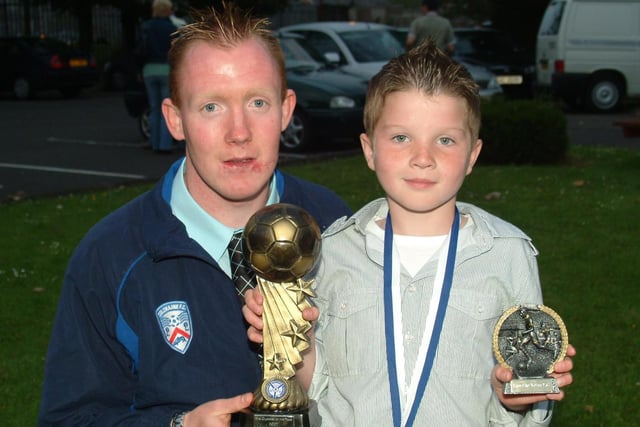 CLUBMAN...Kyle McVeigh pictured with Junior Clubman of the Year and Players Player of the Year, Adam Harte at the East End FC Prize Night on Tuesday.CR24-113KM