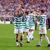 Celtic captain Paul Lambert (right) and Henrik Larsson thank the Celtic fans for their support after their brave performance against came up short in the 3-2 UEFA Cup final defeat in Seville against Porto 18 years ago. (Photo by SNS Group).