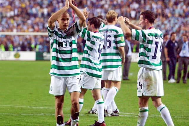 Celtic captain Paul Lambert (right) and Henrik Larsson thank the Celtic fans for their support after their brave performance against came up short in the 3-2 UEFA Cup final defeat in Seville against Porto 18 years ago. (Photo by SNS Group).