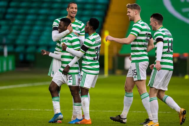 Celtic's Ismaila Soro celebrates his opener and first goal fro the club with Christopher Jullien and Jeremie Frimpong (right) that set Neil Lennon's men on their way to a 3-0 win over Dundee United. (Photo by Craig Williamson / SNS Group)
