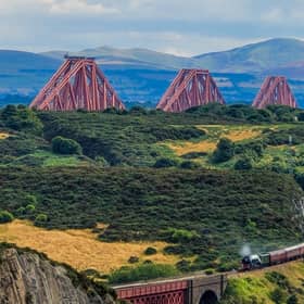 Train routes follow the rugged east coast affording spectacular views. Image: Ryan Edge
