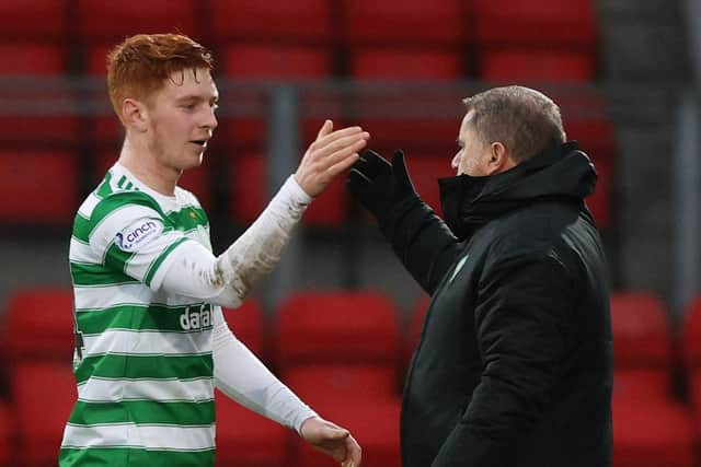 Ange Postecoglou with Joey Dawson, who became the 34th player used by the Celtic manager this season after making his debut against St Johnstone on Boxing Day. (Photo by Craig Williamson / SNS Group)