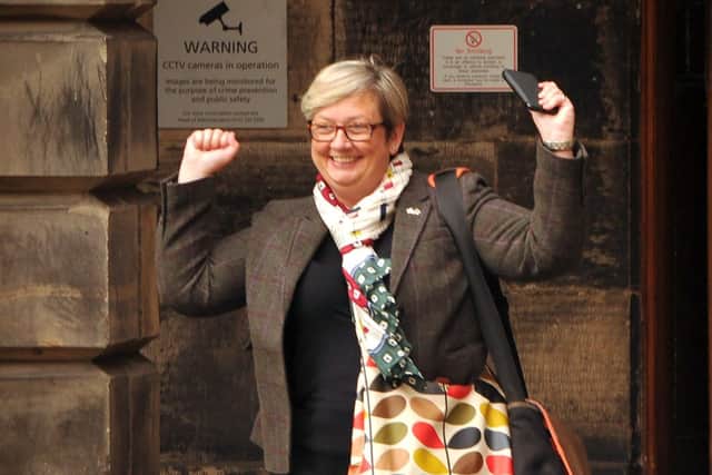 Joanna Cherry, Scottish National Party (SNP) MP smiles as she leaves the Court Of Session in Edinburgh.
