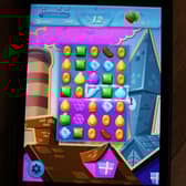 Candy Crush is a favourite form of entertainment for many commuters on public transport (Picture: Joe Raedle/Getty Images)