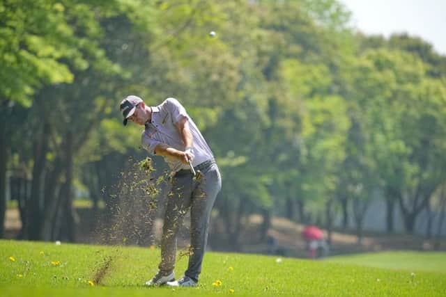 David Law plays his second shot on the 18th hole during day one of the ISPS Handa Championship. Picture: Yoshimasa Nakano/Getty Images.