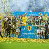The jubilant Celtic players lift the Scottish Cup. Pic: Lisa Ferguson