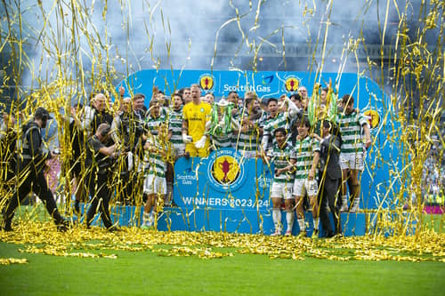 The jubilant Celtic players lift the Scottish Cup. Pic: Lisa Ferguson
