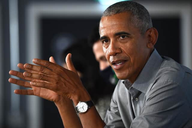 GLASGOW, SCOTLAND - NOVEMBER 08: Former US President Barack Obama gestures as he speaks during a round table meeting at the University of Strathclyde. Photo by Jeff J Mitchell/Getty Images