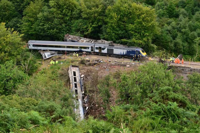Emergency services inspecting the scene near Stonehaven, Aberdeenshire, following the derailment of the ScotRail train, which cost the lives of three people. Picture: Ben Birchall/PA Wire
