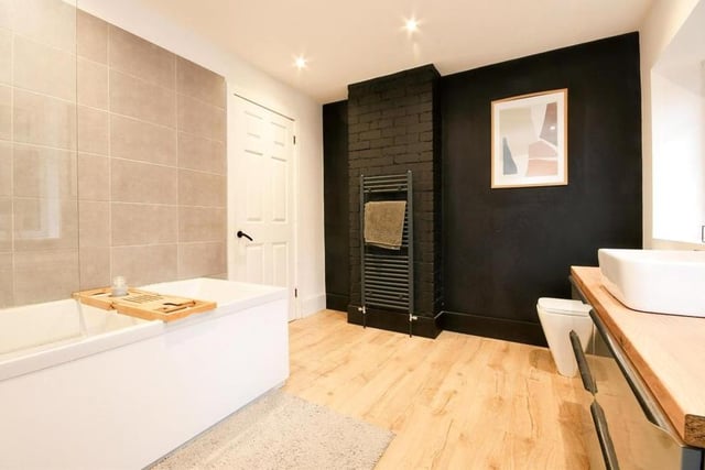 The second shot of the modern, refitted bathroom. Sleek and stylish are the words we'd use to describe it.