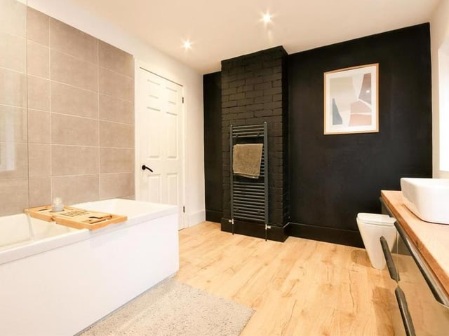 The second shot of the modern, refitted bathroom. Sleek and stylish are the words we'd use to describe it.