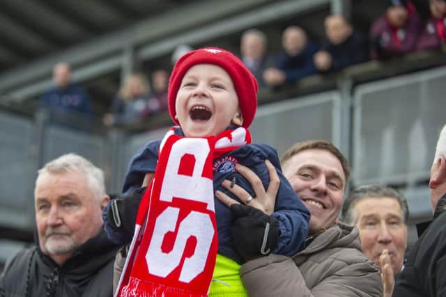 A young Spartans fan cheers on his favourites at home ground Ainslie Park. The club take in Edinburgh City in what is sure to be a hotly-contested derby this afternoon (Picture: Lisa Ferguson) Scottish Cup - Spartans FC v Hearts FC, Ainslie Park, Edinburgh Spartans Goal 1-1