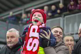 A young Spartans fan cheers on his favourites at home ground Ainslie Park. The club take in Edinburgh City in what is sure to be a hotly-contested derby this afternoon (Picture: Lisa Ferguson)    Scottish Cup -  Spartans FC v Hearts FC, Ainslie Park, Edinburgh    Spartans Goal 1-1