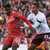 Aberdeen's Luis Lopes and Hearts' Toby Sibbick in action during the previous clash at Pittodrie in October. (Photo by Craig Foy / SNS Group)