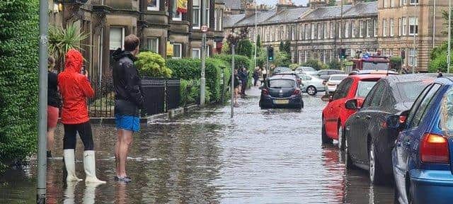 Scenes in Stockbridge, Edinburgh, during flash floods last month.