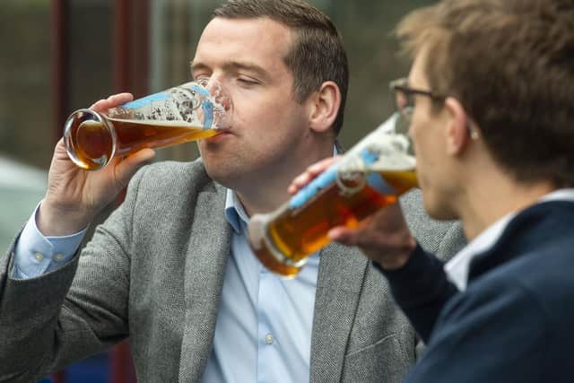 Scottish Tories leader Douglas Ross enjoys a pint at the Edinburgh Brewing Company in Newington. Picture: Lisa Ferguson







SCOTLANDSCOVID RESTRICTIONS MOVE INTO LEVEL 3 TODAY WHICH MEAN PUB AND RESTAURANTS CAN RE-OPEN, WITH ALCOHOL PERMITTED TO BE DRANK OUTSIDE