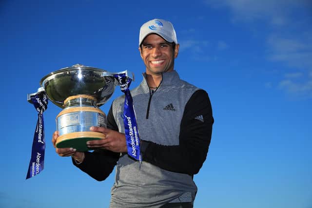 Aaron Rai beat Tommy Fleetwood in a play-off to get his hands on the Scottish Open trophy at The Renaissance Club. Picture: Andrew Redington/Getty Images.