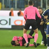 Match referee Halil Umut Meler was assaulted following the Turkish Super Lig clash between Ankaragucu vs. Rizespor in Ankara, Turkey, on 12 December 2023. At the end of the match, Ankaragucu club president Faruk Koca (centre) punched referee Halil Umut Meler in the face. The referee fell to the ground and was kicked by people entering the field. Photo by Abdurrahman Antakyali/Depo Photos via ZUMA Press Wire/Shutterstock (14253645d)