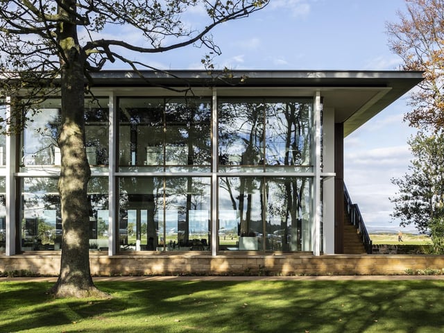 St Andrews Links Trust operates the seven public golf courses that constitute the 'Home of Golf': revered by the worldwide golfing community and cherished by local residents as a place for outdoor recreation and relaxation. The new HQ is grounded within its landscape, using highly tailored architecture to encapsulate the Trust’s values of quality, heritage and commitment to excellence. Sandstone masonry – a common material across St Andrews – is juxtaposed with lighter framed construction in timber, glass, zinc and aluminium in a pavilion-style building that presents a new public presence for the Trust and commands exceptional views over the surrounding golf courses. Nicoll Russell Studios harnessed this setting to create an office building that draws upon, and augments, a very distinct sense of place.