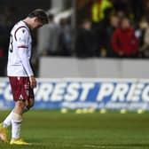 Arbroath's Scott Allan was sent off in the 2-0 defeat by Partick Thistle.