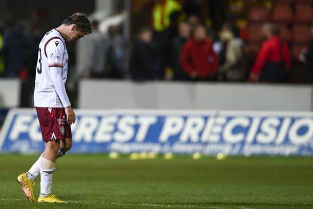 Arbroath's Scott Allan was sent off in the 2-0 defeat by Partick Thistle.