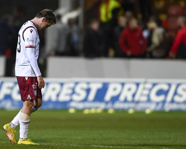 Arbroath's Scott Allan was sent off in the 2-0 defeat by Partick Thistle.