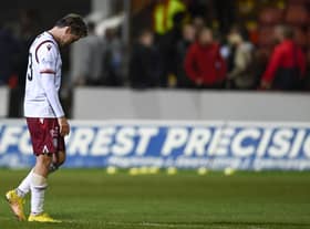 Arbroath's Scott Allan was sent off in the 2-0 defeat by Partick Thistle.