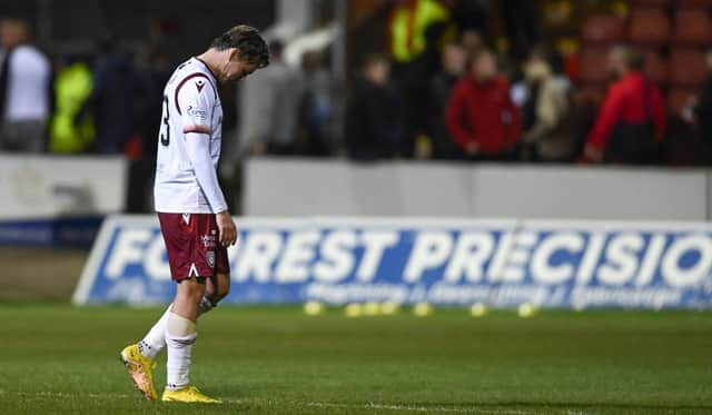 Arbroath's Scott Allan was sent off in the 2-0 defeat by Partick Thistle.