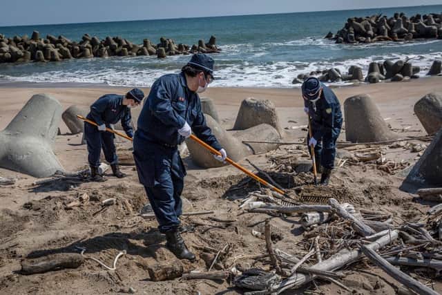 The search for the remains of people who went missing after the 2011 earthquake and tsunami is ongoing, 10 years after the event (Photo: Yuichi Yamazaki/Getty Images)