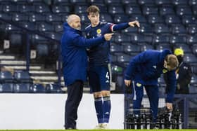 Scotland manager Steve Clarke (left) chats to Jack Hendry during a World Cup qualifier against Austria at Hampden in 2021. Hendry could reach 25 caps in this international window  (Photo by Craig Williamson / SNS Group)